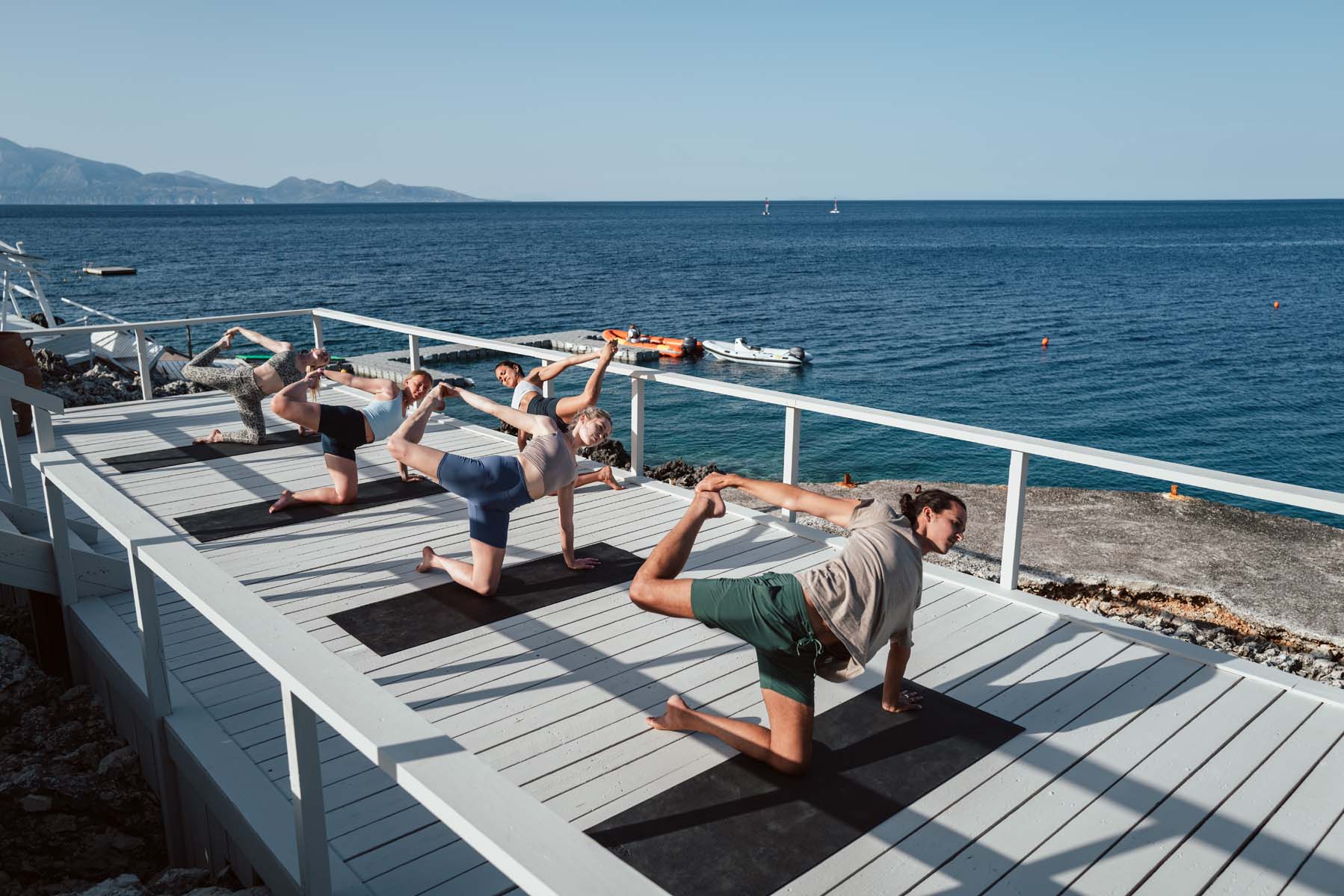 Yoga class by the sea