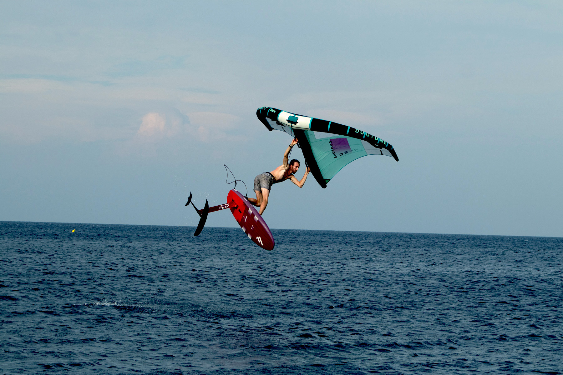 A man wing foiling