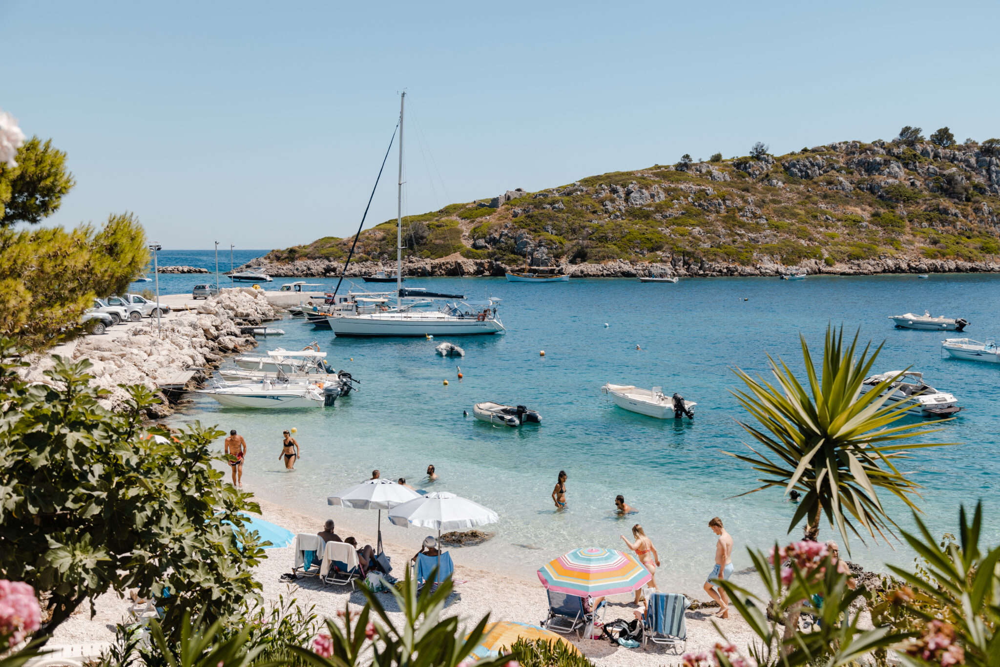 shot of beach of zakynthos island In Greece with boats on the sea