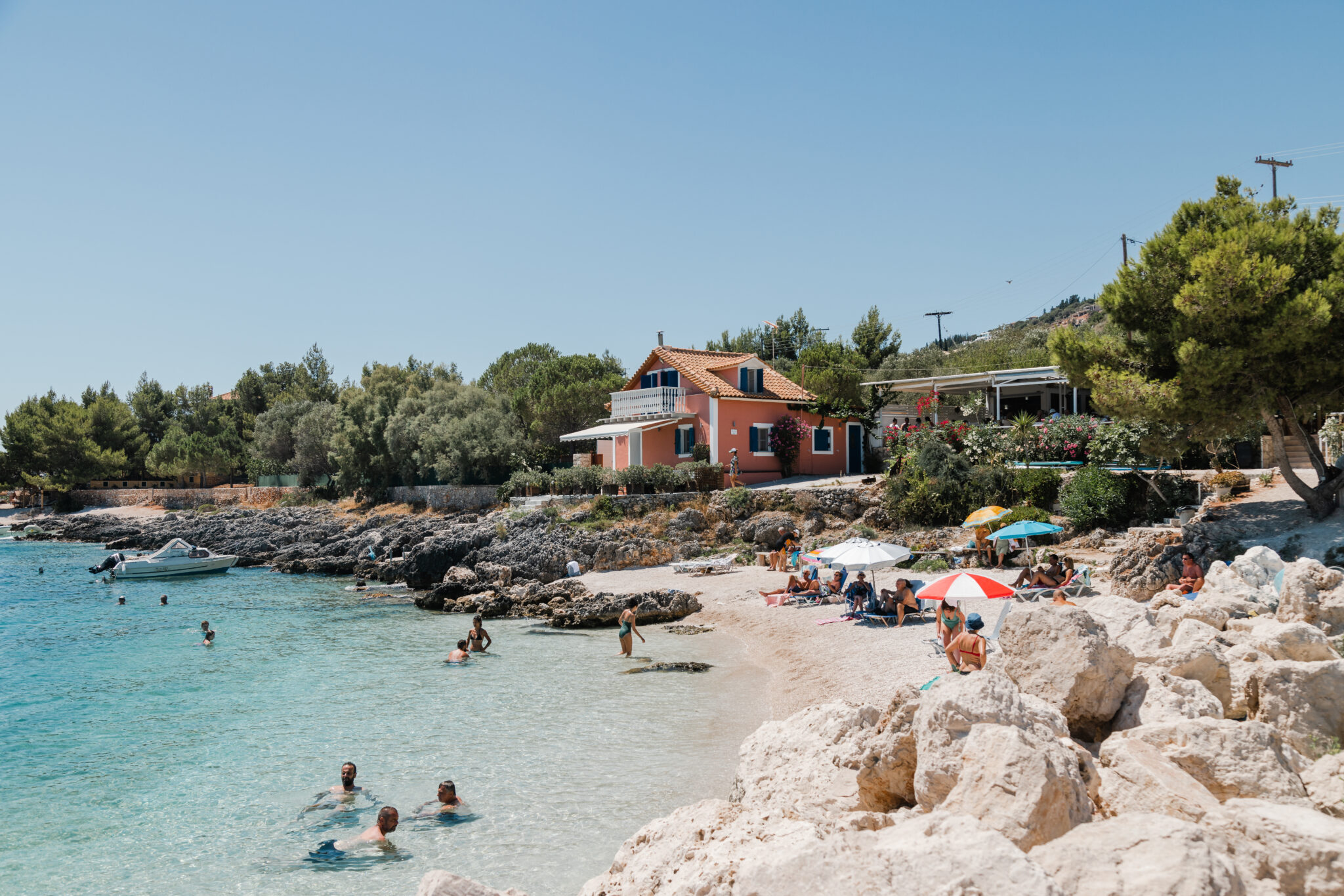 zakynthos island beach with a pink house
