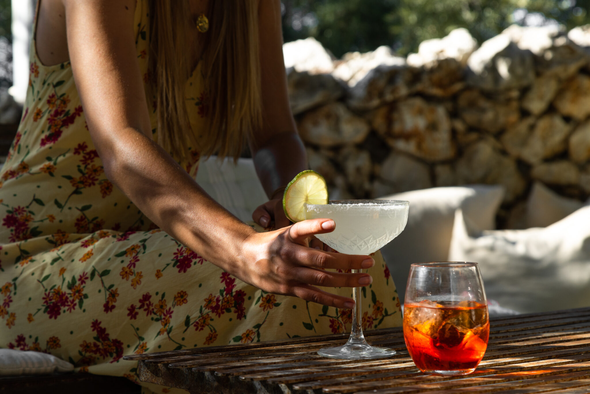 drinking at the pool bar with a cocktail